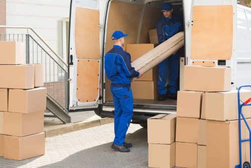 Local man and van team loading furniture in Brompton street
