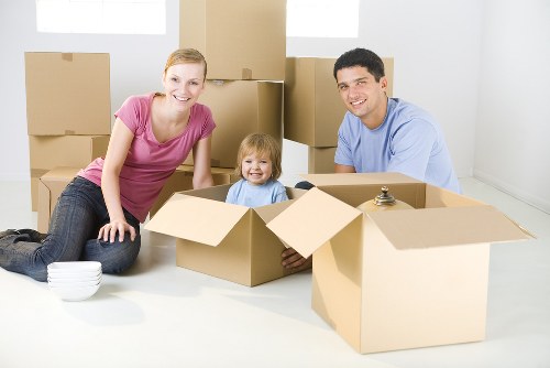 Local removals team planning a move in Brompton with boxes and furniture