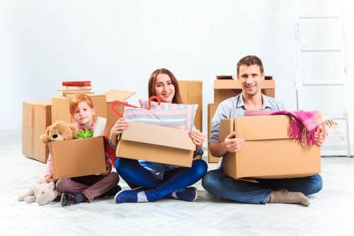 Movers handling stairs and access challenges in a Brompton property