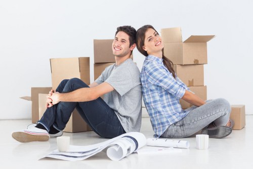 Professional team moving furniture from a townhouse in Brompton