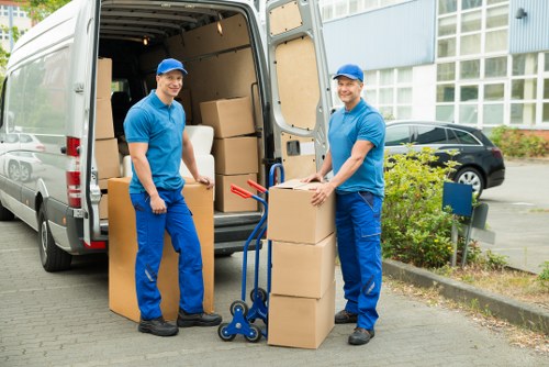 Packed boxes and furniture prepared for a Brompton house removal