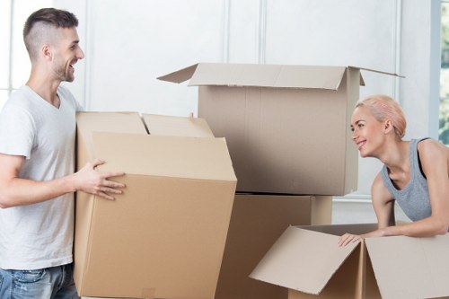 Prepared boxes and furniture ready for a man with van booking in Brompton