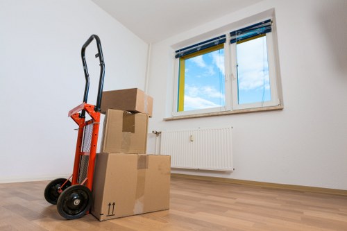 Professional movers handling a flat move in Brompton with care