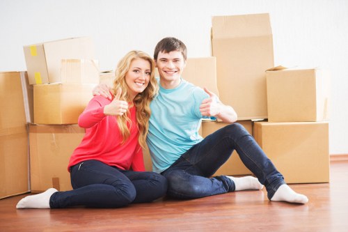 Boxes and furniture prepared for a student house move in Brompton