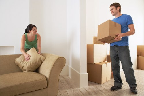 Packed boxes and luggage ready for student removals in Brompton