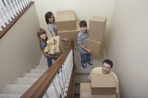 Loading furniture into a van for a Brompton property move